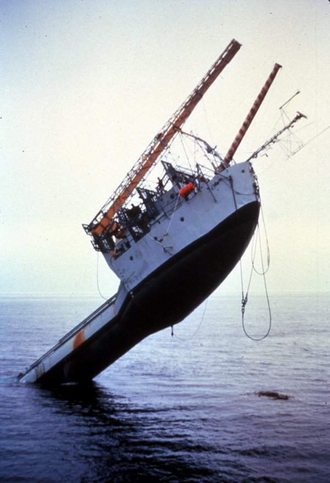 RP FLIP - an acronym of Floating Instrument Platform - rearing upward as the other end of the ship ploughs downwards. Eventually it'll be floating vertically in the water.