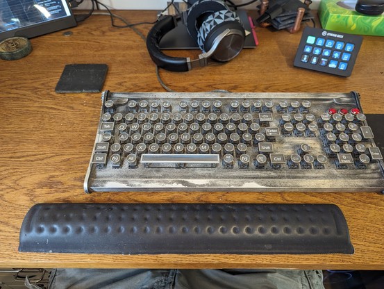 keyboard offset to the right, so that the main qwerty section is centred on the body.