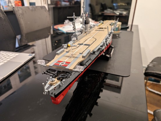 Bow first view of brick built German aircraft carrier.