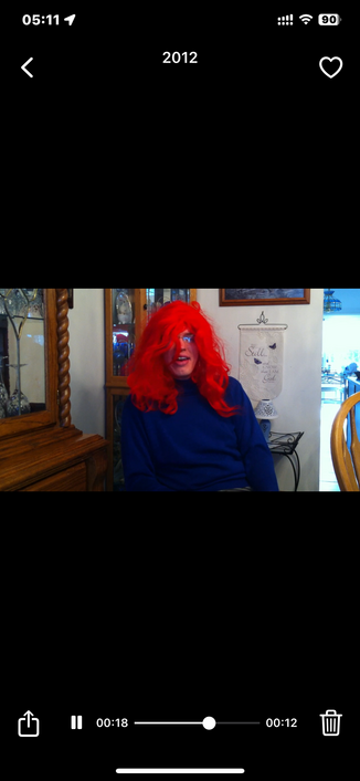 A scene from a video in 2015 when Jae was dressed up as a woman in a red wig