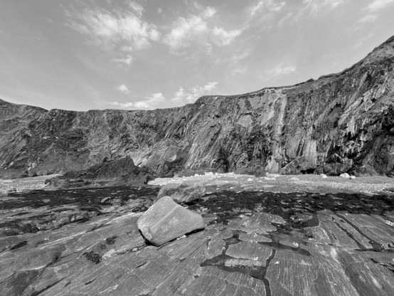 Black and white view of rocks and cliffs