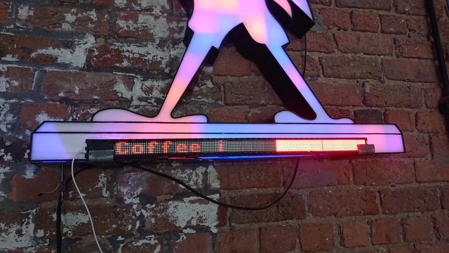 An LED matrix display where the first half reads "Coffee I" and the second half has some blank space and then the rest is a solid rectangle of illuminated LEDs 