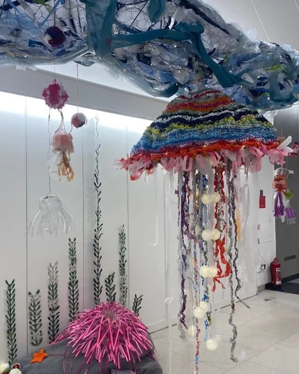Large jelly crocheted from colourful reused carrier bags, smaller jellies made from PET bottles,fruit nets, plastic etc.