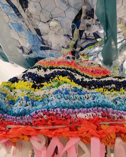 Large jelly crocheted from colourful salvaged carrier bags by Sanna