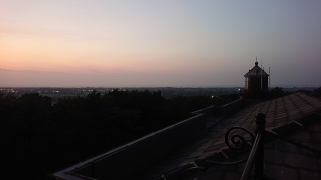 Looking out over the Wirral Peninsula and the Irish Sea at dusk. In the foreground the top of Bidston Lighthouse pokes up into the sjy