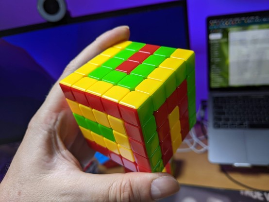 A 5x5 Rubik's Cube with a pattern the name of which I do not know