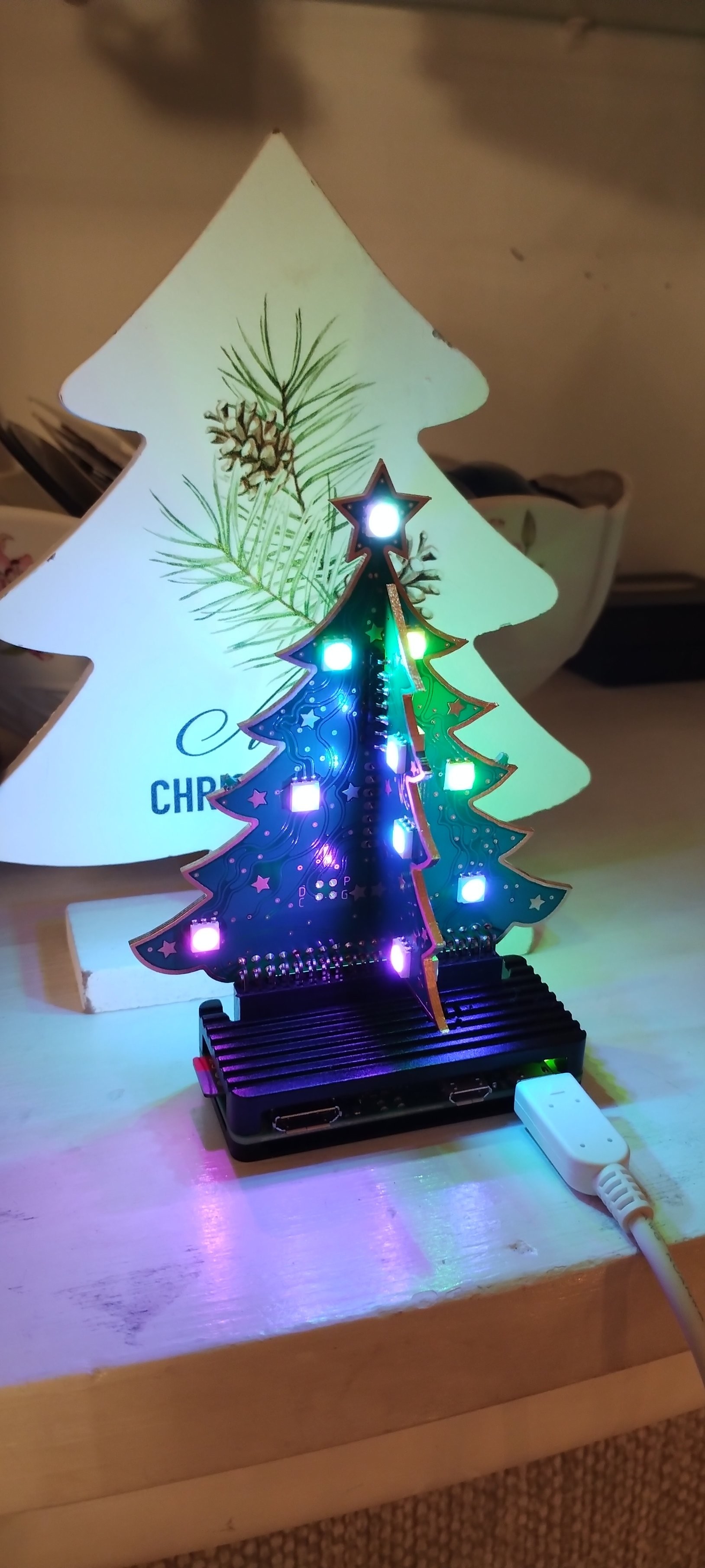 A picture of the tree lit up and attached to a Raspberry Pi Zero 2W