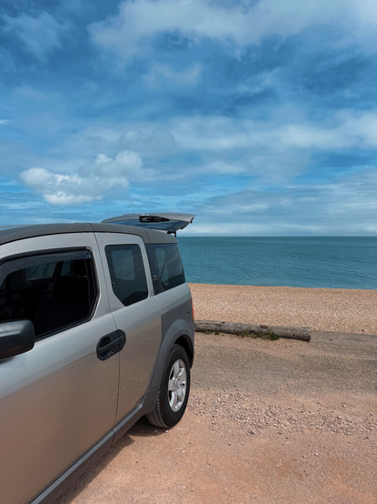 Honda element looking resplendent in the sunshine at Slapton Sands in South Devon