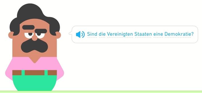 Oscar, the Duolingo character, asks, "Sind die Vereinigten Staaten eine Demokratie?" (Are the United States a democracy?)